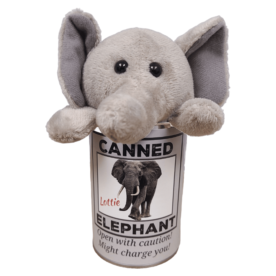 Plush elephant toy inside a can labeled 'Canned Elephant' on a white background