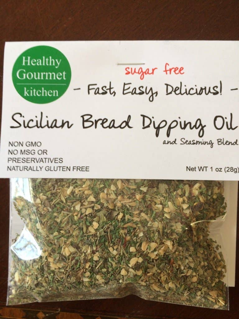 Packaging of Healthy Gourmet Kitchen Sicilian Bread Dipping Oil on a wooden surface