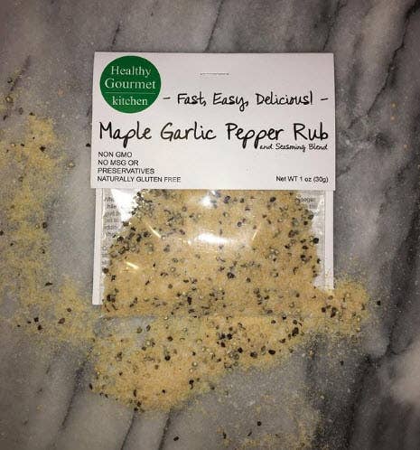 Maple Garlic Pepper Rub packaging on a gray marble surface