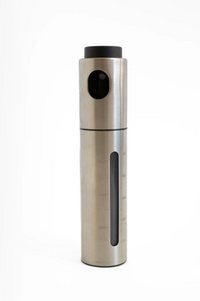 Stainless steel pepper grinder on a white background