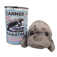 Plush manatee toy next to a can labeled 'Canned Manatee' on a white background